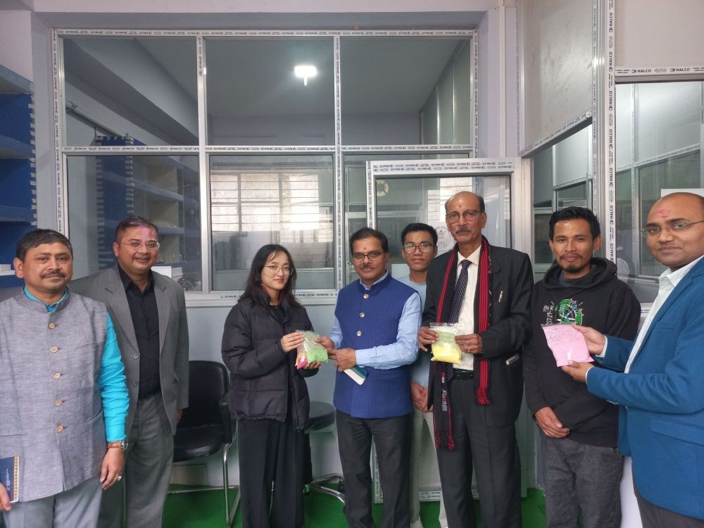 The PhD research scholars at Corrosion and Electrochemistry Research Group (CERG) at Nagaland University, Lumami present their environmentally friendly colours for the festival of Holi. (Photo Courtesy: PRO NU)